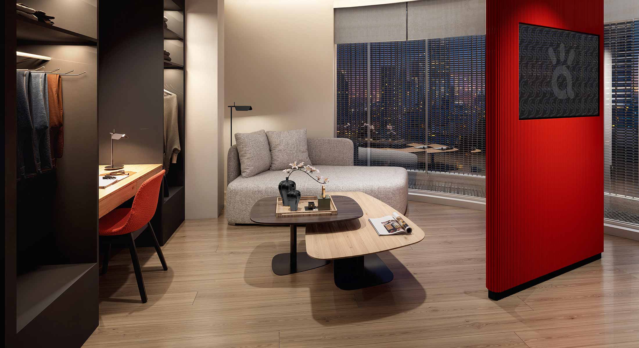 Modern hotel room with a grey daybed, nesting coffee tables, and a city view.