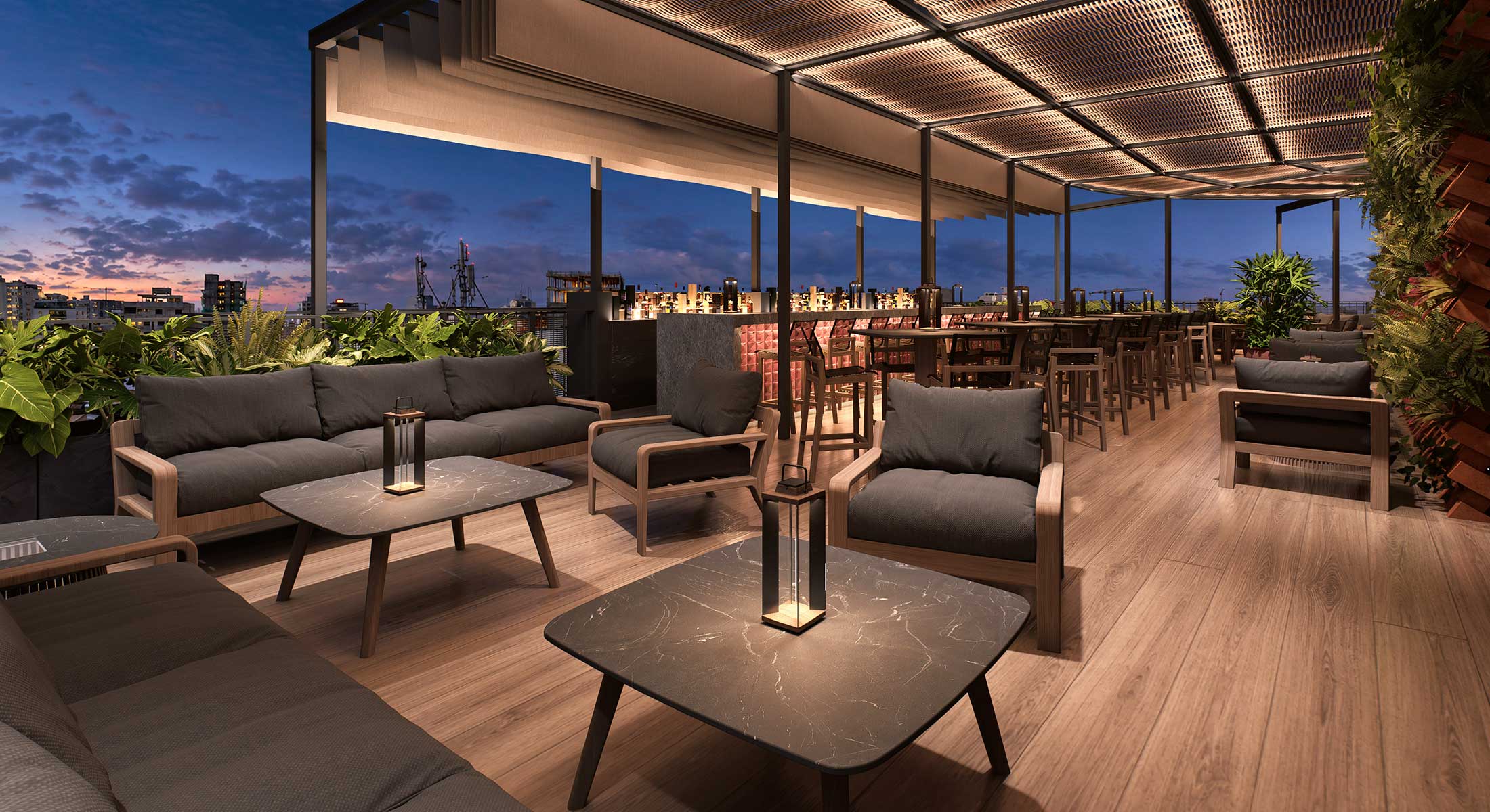 Modern rooftop lounge with outdoor seating and a bar at dusk.